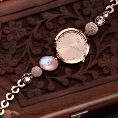 https://cmv360.s3.ap-southeast-1.amazonaws.com/Titan_NS_2606_WM_08_Raga_Women_s_Charm_Watch_1750c0c963.jpg